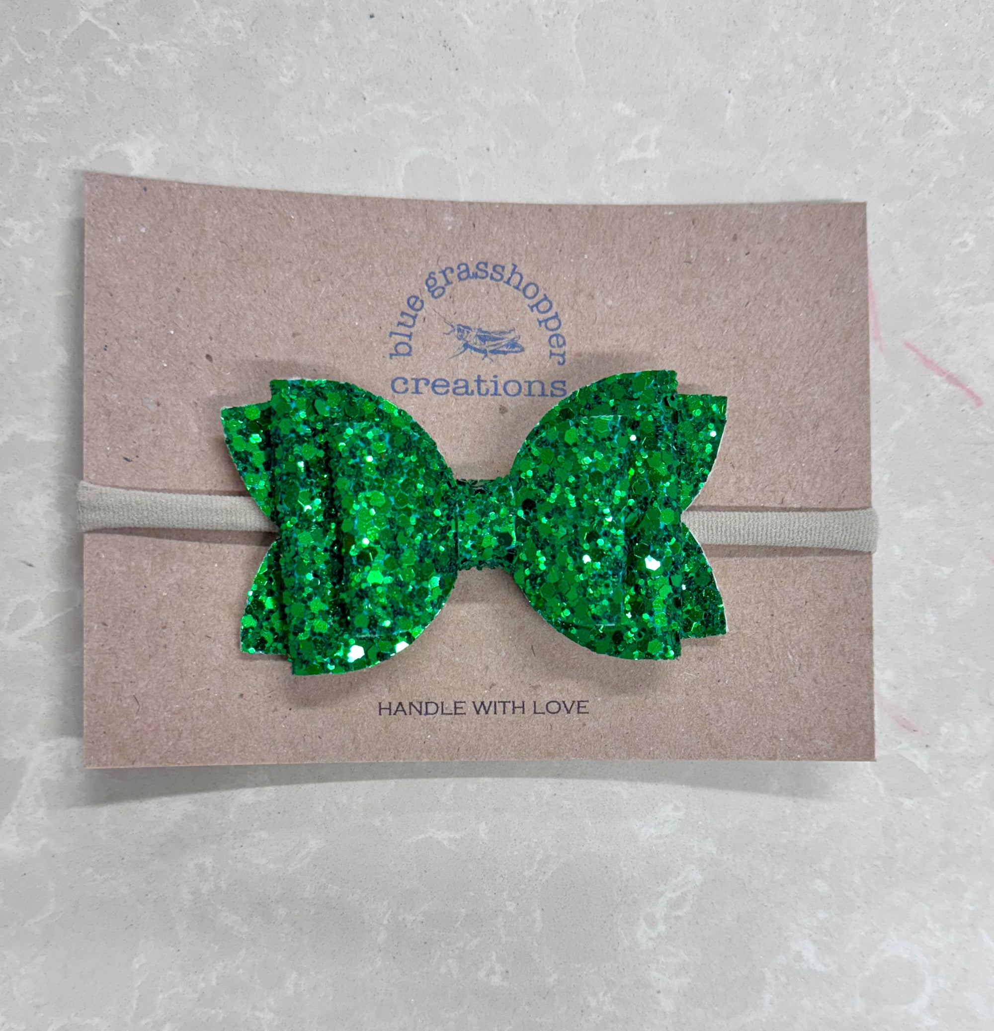 Blue Grasshopper Creations Faux Leather Bow with Glitter Nylon Headband - Green Glitter